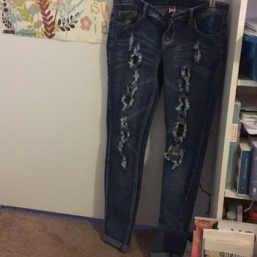 Size 7 ripped and patched skinny jeans